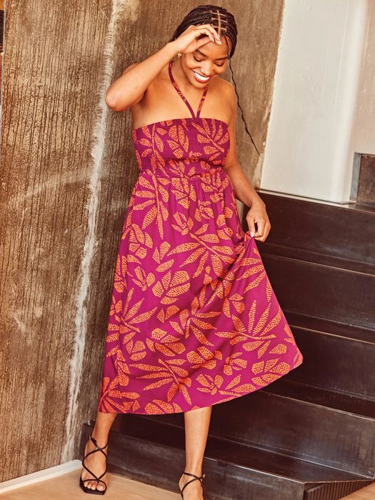 Model wearing the tonal botanical dress