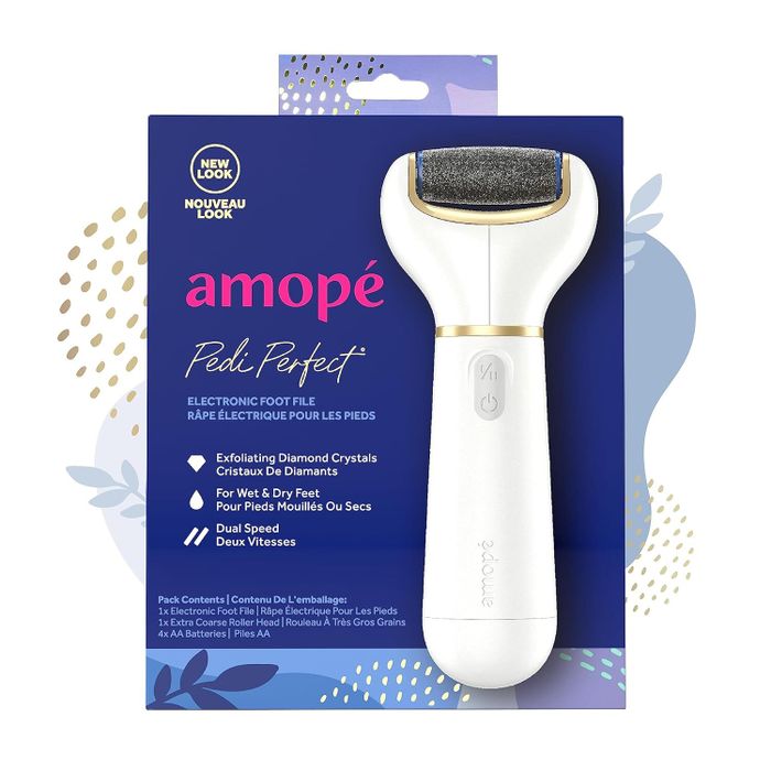 The Amope Pedi Perfect electronic foot file comes in its packaging with diamond crystals for exfoliation, suitable for both wet and dry feet, and features dual speed settings.