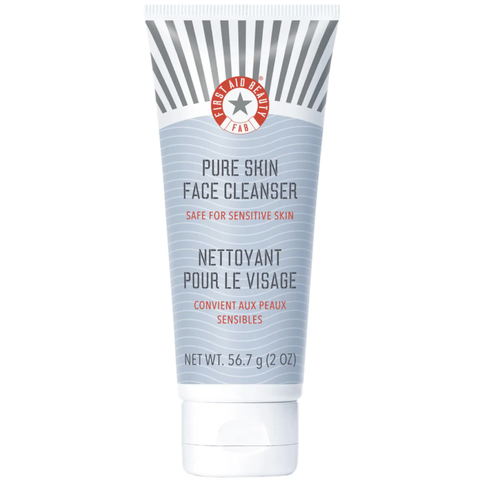 A tube of First Aid Beauty's Pure Skin Face Cleanser, 56.7g, highlighting both the bilingual product name and the 