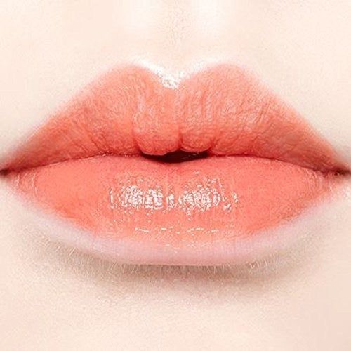 Lips in a peachy orange shade