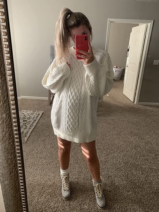 reviewer mirror selfie in the white sweater dress