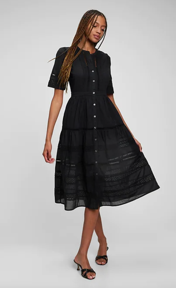 model wearing the black dress