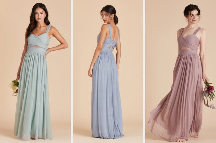 The model is wearing a sleeveless maxi dress with a crisscross bodice and mesh panels, holding a bouquet of flowers while barefoot. Another view shows the model from the back in a light blue version of the dress on a tan background, with another shot of the same model in purple, also barefoot with flowers in hand.