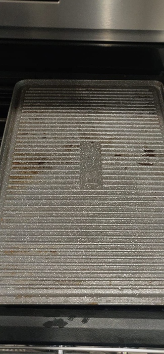 the same grill now spotless after cleaning
