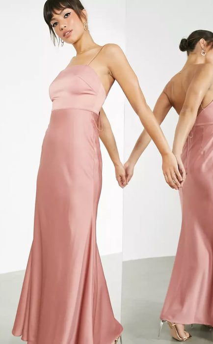 Model showcasing a square neck tie-back rose gold dress.