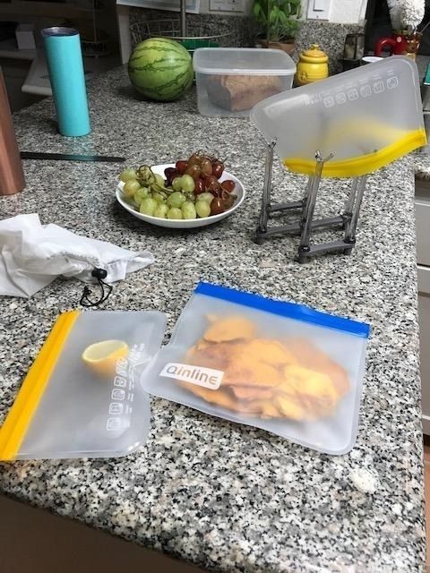 Reusable silicone food bags displayed on a kitchen counter, showcasing eco-friendly storage solutions
