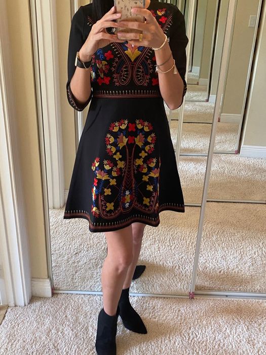reviewer mirror selfie showcasing the dress