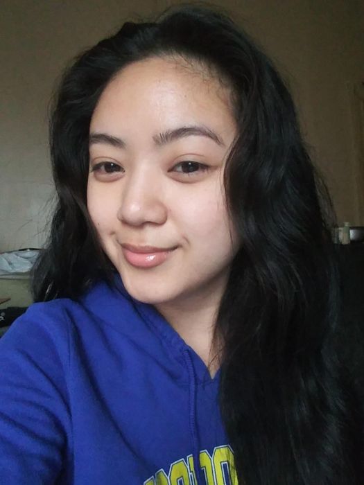 Reviewer with a satisfied expression.