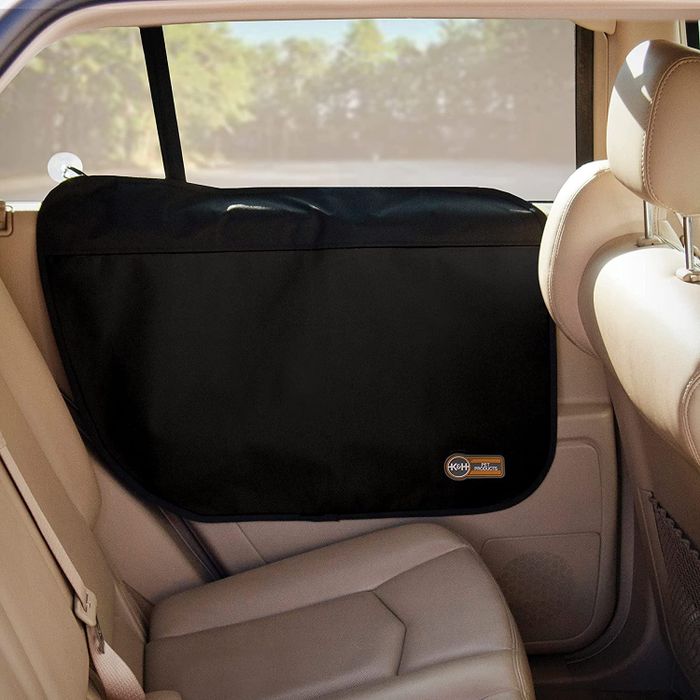 the black protector installed on the interior side of a car door