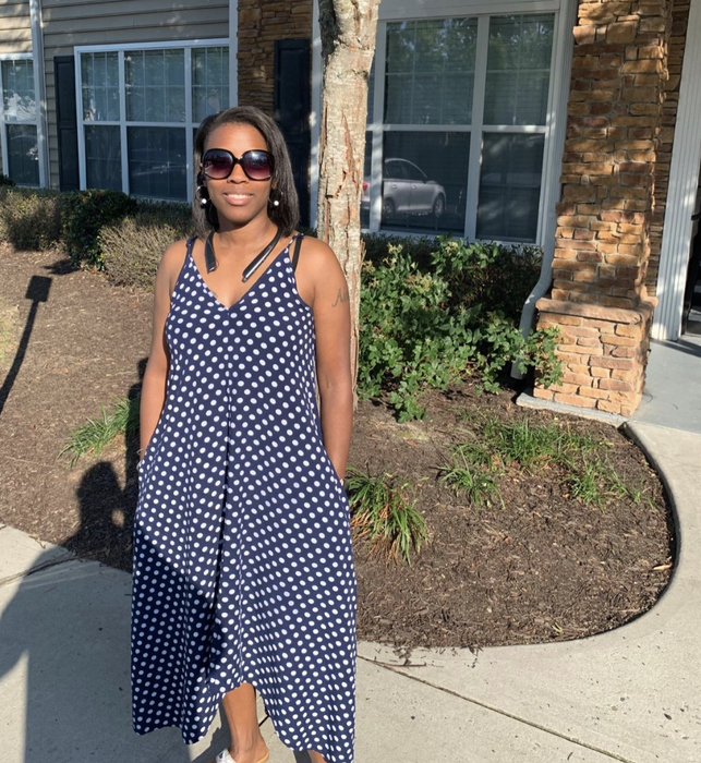 reviewer modeling the dress in blue and white
