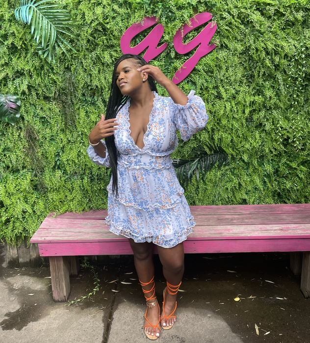 reviewer modeling the dress in blue