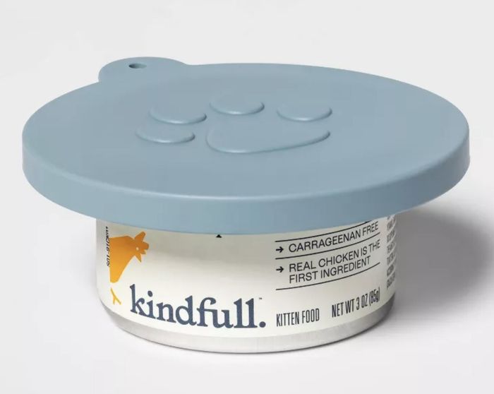A kitten food container featuring a cute pawprint lid. The label reads 
