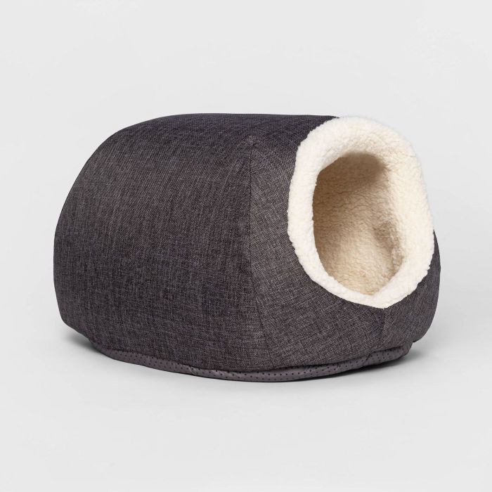 A gray pet cave lined with soft sherpa material.