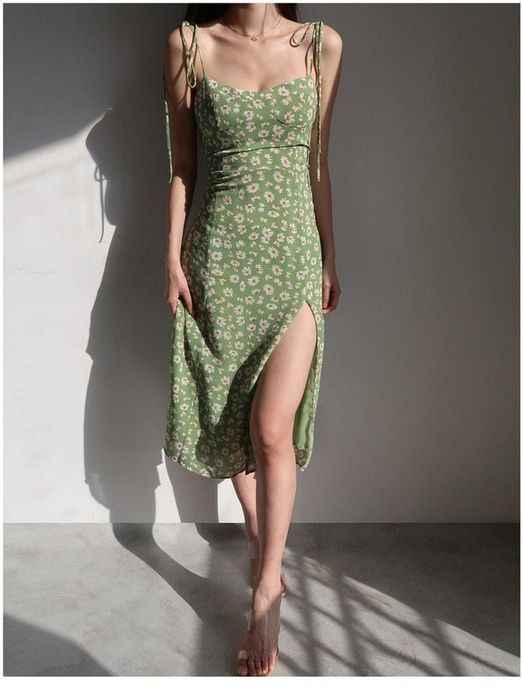 model showcasing the dress in green