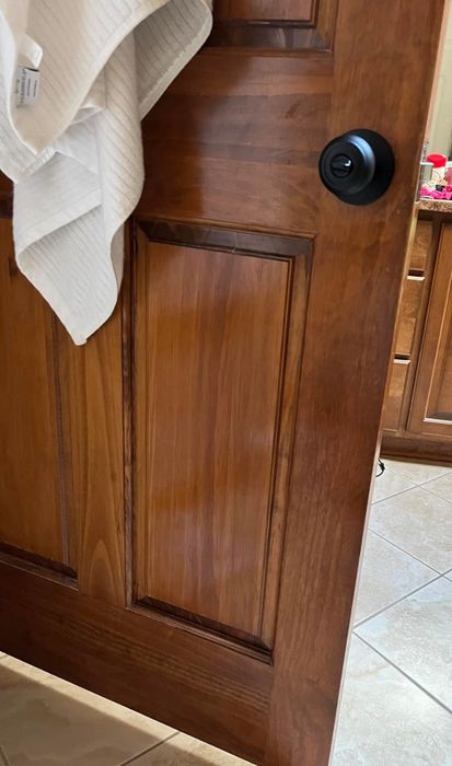 after image of the same cabinet now restored to a smooth, scratch-free finish