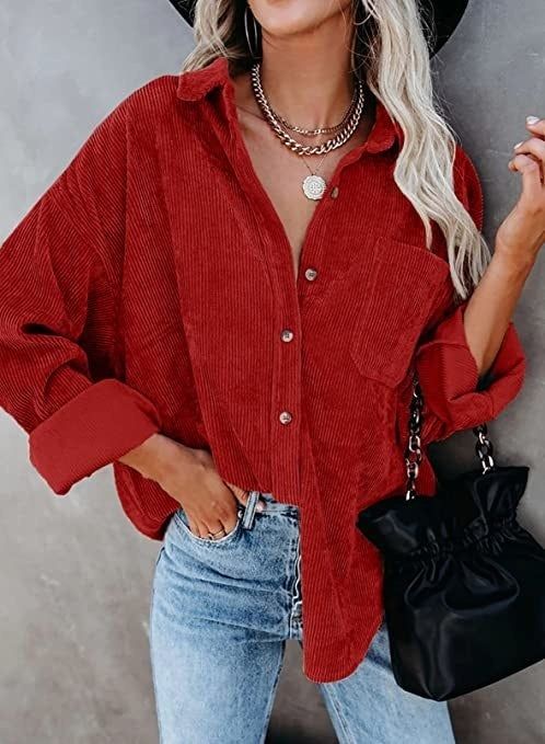 model showcasing a red corduroy button-up shirt