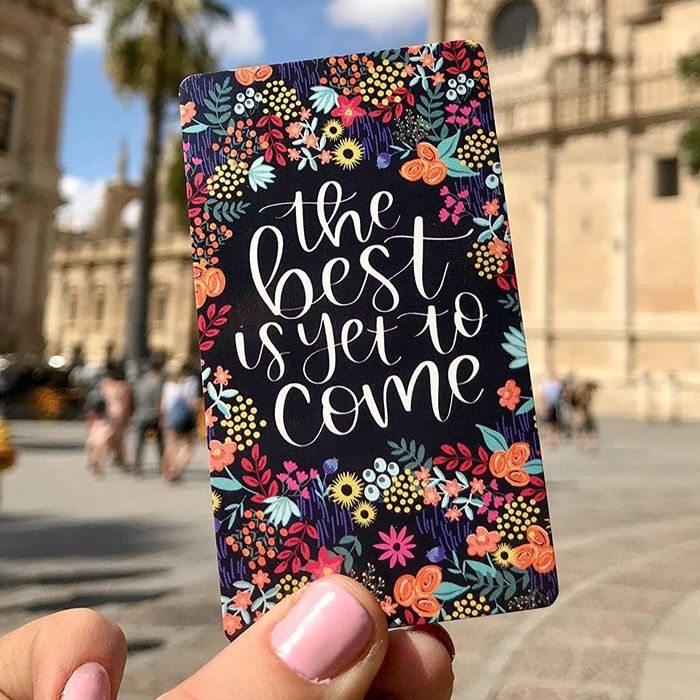 a black card displaying the optimistic phrase