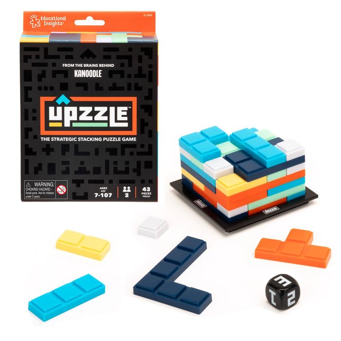 Uzzle puzzle game set featuring vibrant geometric pieces and dice, designed for ages 7 to 107, shown with its packaging