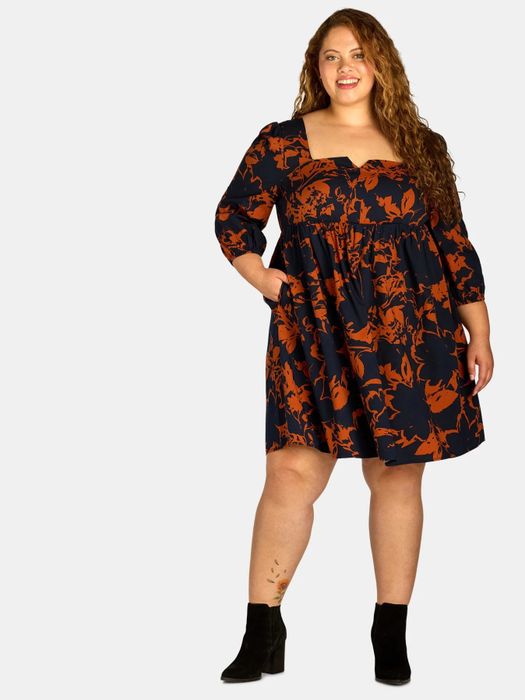 Model wearing the dark navy floral dress