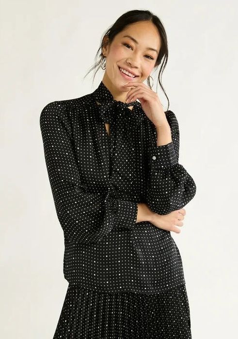 Model wearing the vintage dots blouse