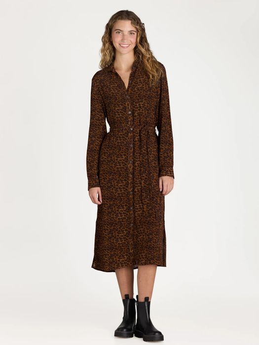 The model rocking the leopard print dress