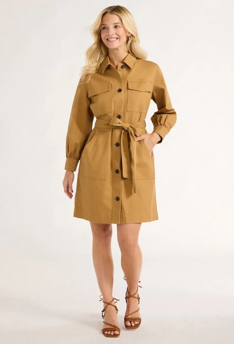 Model wearing the dijon-colored dress