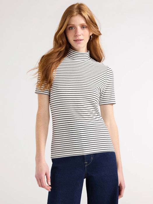 Model wearing the black and white top