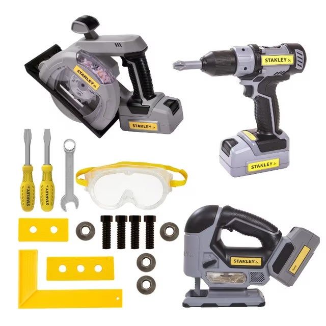 Stanley toy tool set featuring a pretend saw, drill, safety goggles, screwdriver, wrench, and other accessories, crafted specifically for young builders
