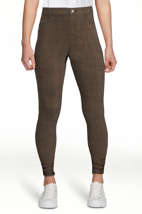Model showcasing the brown jeggings
