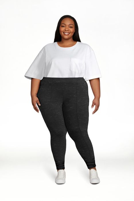 Model wearing the black space dye jeggings