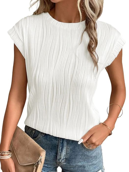 Model wearing the white top