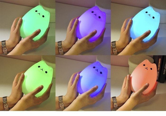 The lamp in vibrant green, blue, and red settings