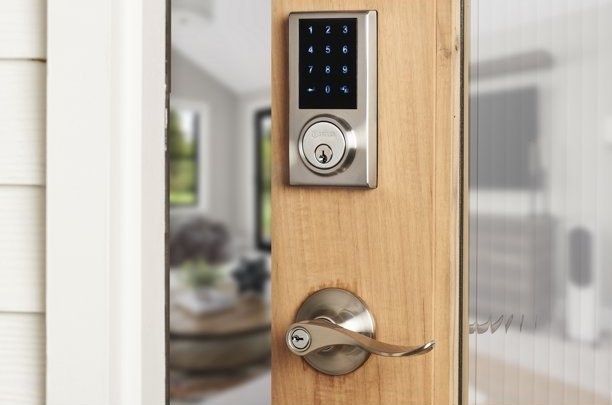 A smart lock with a touchscreen keypad installed on a wooden door, showcased in a shopping feature