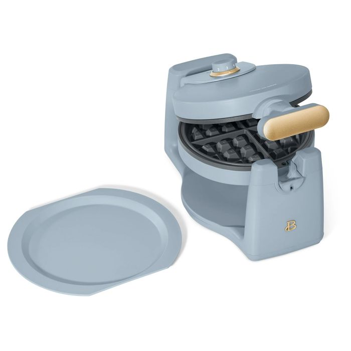 A waffle maker featuring an open griddle design and a sleek handle, perfect for effortless and quick breakfast creation
