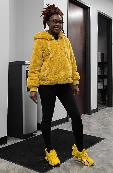 Reviewer wearing the electric yellow version