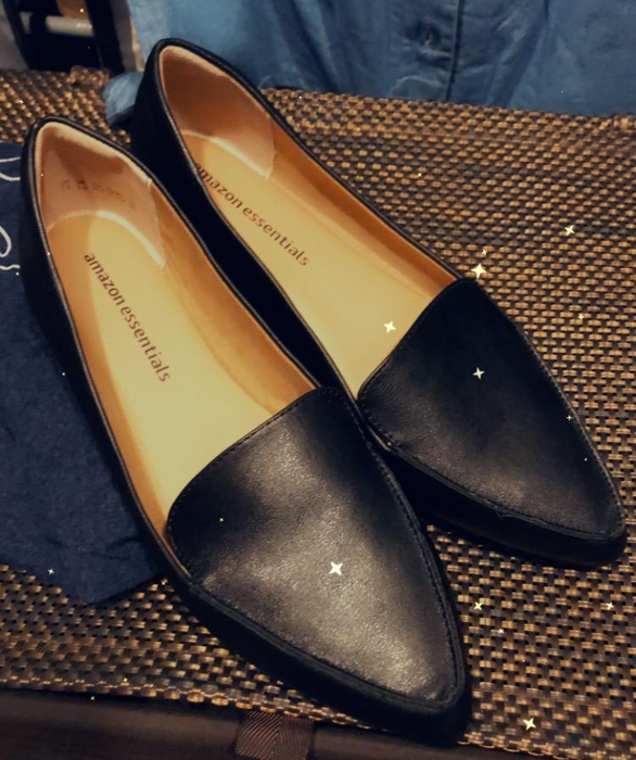 a photo of black pointed-toe loafers shared by a reviewer