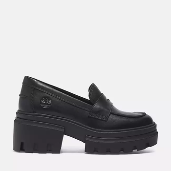 Black platform loafers featuring a thick sole and brand detail, perfect for a variety of styles