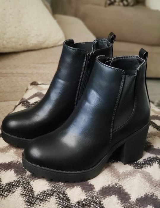 reviewer photo of a pair of black platform booties