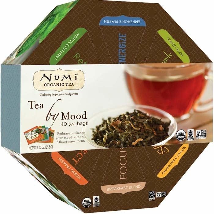 A brown octagon-shaped box with the brand name 'Numi' prominently displayed on top.