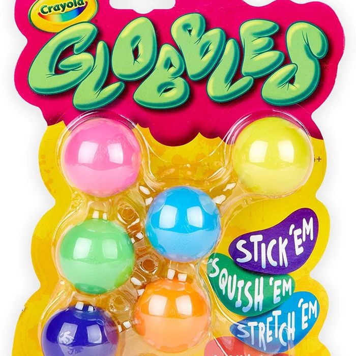 Six colorful balls packaged in yellow