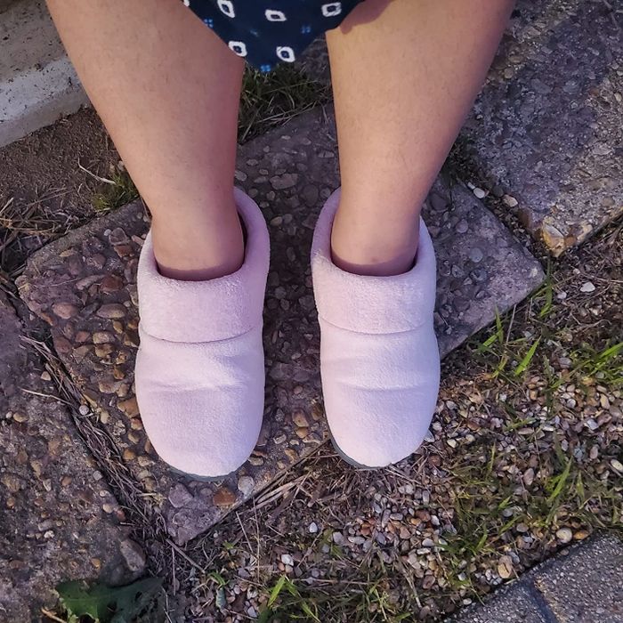 Customer showing off the slippers