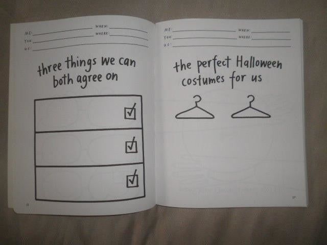 The book opened to display two activity pages: 'Three things we can both agree on' (left) and 'The perfect Halloween costumes for us' (right)