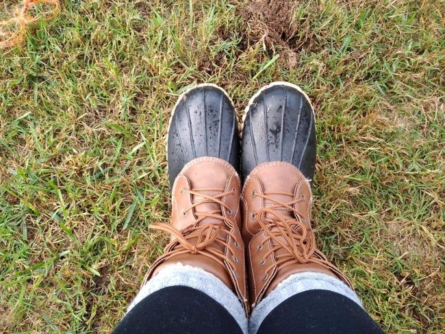 reviewer's duck boots with dark black plastic part