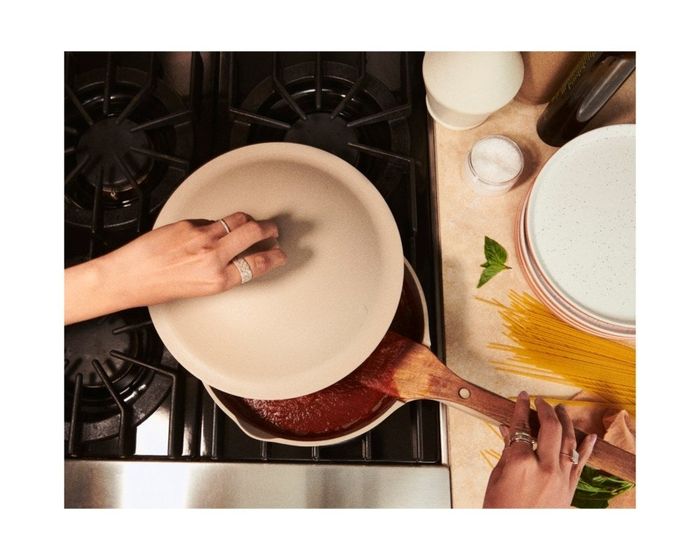 The pan being used to simmer a rich tomato sauce