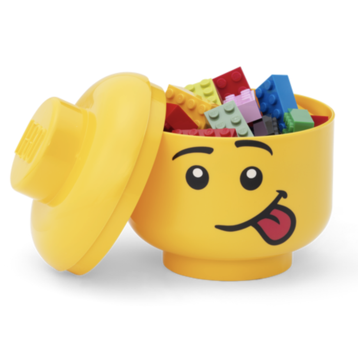 the storage container with its lid removed, filled with colorful Lego pieces