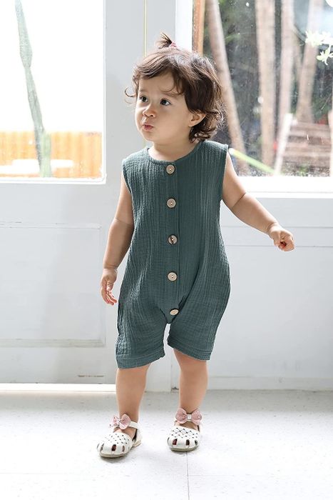 A child wearing a cozy onesie jumper