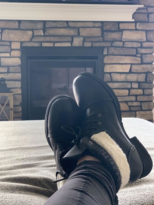 black leather boots with fur at the top