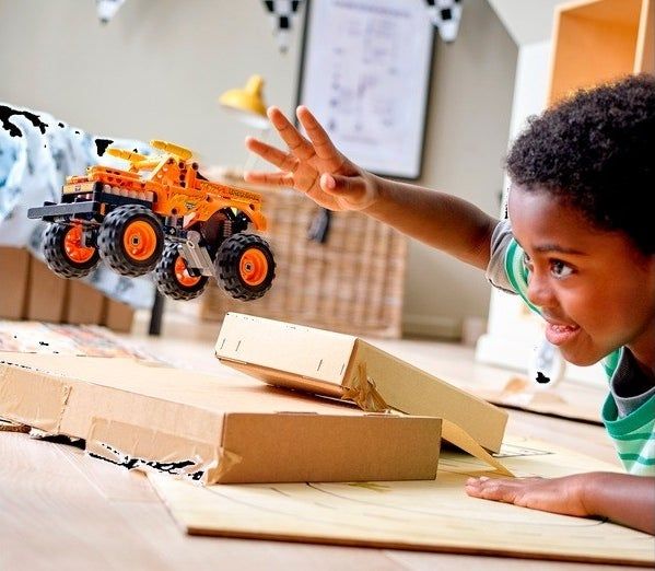 a child playing with the truck