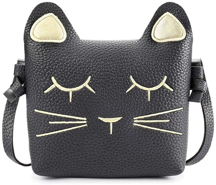 a black cat-shaped bag featuring gold-stitched ears and a face