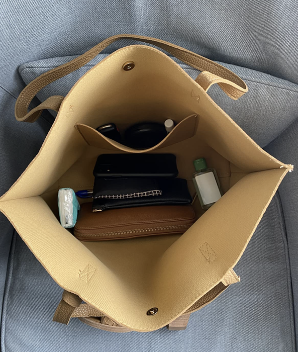 A reviewer’s photo showcasing the spacious interior of the bag
